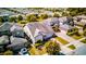 Beautiful single-Gathering home with a well-manicured lawn, brick driveway, and two-car garage at 5118 Tiber Way, St Cloud, FL 34771