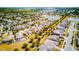 Aerial photograph capturing the picturesque neighborhood, homes, ponds, and community layout at 5118 Tiber Way, St Cloud, FL 34771