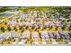 Beautiful aerial view of a well-planned community with manicured lawns and scenic water features at 5118 Tiber Way, St Cloud, FL 34771