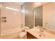 Bathroom featuring shower, bathtub, toilet, sink, and tiled flooring at 5118 Tiber Way, St Cloud, FL 34771
