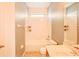 Bathroom featuring shower, bathtub, toilet, sink, and tiled flooring at 5118 Tiber Way, St Cloud, FL 34771