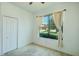 Cozy bedroom featuring carpet, a ceiling fan, and a large window with natural light at 5118 Tiber Way, St Cloud, FL 34771