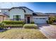 Charming single-Gathering home with well-maintained landscaping, brick driveway, and a two-car garage at 5118 Tiber Way, St Cloud, FL 34771
