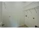 Bright laundry room with shelving and washer/dryer hookups at 5118 Tiber Way, St Cloud, FL 34771