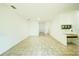 Open living space with a granite countertop desk area and tile flooring at 5118 Tiber Way, St Cloud, FL 34771