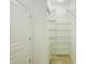 Organized pantry with shelving for ample storage at 5118 Tiber Way, St Cloud, FL 34771