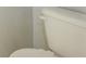 Close up of a white toilet in a bathroom setting at 5118 Tiber Way, St Cloud, FL 34771