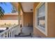 Charming front porch area with brick flooring and seating at 523 Shell Creek St, Poinciana, FL 34759