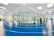 Indoor walking track with large windows providing a view of the outdoors at 523 Shell Creek St, Poinciana, FL 34759