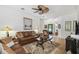 Bright living room with hard wood floors, and cozy furniture at 523 Shell Creek St, Poinciana, FL 34759
