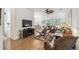 Inviting living room with hardwood floors and comfortable seating area at 523 Shell Creek St, Poinciana, FL 34759