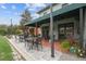 Charming outdoor seating area with tables and chairs, perfect for enjoying the surroundings at 523 Shell Creek St, Poinciana, FL 34759