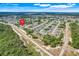 Aerial view of a property and community at 53 Zinnia E Ln, Kissimmee, FL 34759