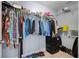 Walk-in closet with clothing racks and a full shelf at 53 Zinnia E Ln, Kissimmee, FL 34759