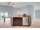 Open kitchen area boasting granite countertops and stainless steel dishwasher at 53 Zinnia E Ln, Kissimmee, FL 34759