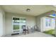 Covered patio with room to entertain guests at 53 Zinnia E Ln, Kissimmee, FL 34759