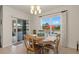 Bright dining area showcasing a wooden table and view of the outdoors at 5759 Marsh Landing Dr, Winter Haven, FL 33881