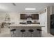 Kitchen featuring granite countertops, an island with bar stool seating, and stainless steel appliances at 5759 Marsh Landing Dr, Winter Haven, FL 33881