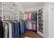 Large walk-in closet featuring custom shelving and ample storage solutions for shoes, clothing, and accessories at 5759 Marsh Landing Dr, Winter Haven, FL 33881