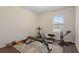 Bright workout room with an exercise bike, weight bench, and free weights for your fitness needs at 5759 Marsh Landing Dr, Winter Haven, FL 33881