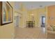 Bright dining area with tile floors, neutral walls, and table with seating for four at 577 Eagle Pointe S, Kissimmee, FL 34746