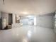 Spacious basement with washer, dryer, and painted walls provides ample storage or flexible living space at 661 Sandy Ridge Dr, Davenport, FL 33896