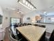 Spacious living area featuring wood floors and an open floor plan at 661 Sandy Ridge Dr, Davenport, FL 33896