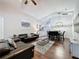 Open concept living area with views to the kitchen and dining room at 661 Sandy Ridge Dr, Davenport, FL 33896