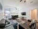 Comfortable living area featuring wood floors, vaulted ceilings, and natural light at 661 Sandy Ridge Dr, Davenport, FL 33896