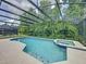 This screened in pool and spa are great for relaxing in a private setting at 661 Sandy Ridge Dr, Davenport, FL 33896