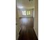 Bedroom features hardwood floors, natural light and neutral walls at 664 Lake Villas Dr, Altamonte Springs, FL 32701