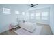 Bright bedroom with a plush bed, wood floors, and natural light at 6953 Broglie St, Orlando, FL 32827