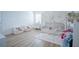 Bright bedroom with a custom bunk bed and light wood floors at 6953 Broglie St, Orlando, FL 32827