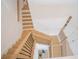 View from above of the house's modern staircase with metal railings and wood treads at 6953 Broglie St, Orlando, FL 32827