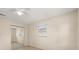 Bedroom with a window, closet, and neutral paint for a calm and bright atmosphere at 704 Michigan Ct # 4, St Cloud, FL 34769