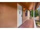 Inviting front entrance with a bright white door and a well-lit porch area at 704 Michigan Ct # 4, St Cloud, FL 34769