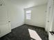 Bedroom featuring carpet, white walls and a single window with a view of the outdoors at 8023 Sayings Dr, Winter Garden, FL 34787