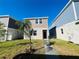 Charming two-story home with a well-maintained lawn at 8023 Sayings Dr, Winter Garden, FL 34787
