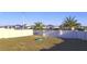 Spacious backyard enclosed by a white fence, offering privacy and room for outdoor activities at 804 Timberland Dr, Eagle Lake, FL 33839