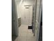 Bright bathroom with tiled floors and access to the shower at 804 Timberland Dr, Eagle Lake, FL 33839