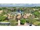 Beautiful clubhouse with a resort-style pool, fountain, and lush landscaping offering a luxurious experience at 8374 Quimby Cir # 8374, Davenport, FL 33896