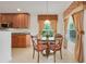 Cozy breakfast nook featuring a table for four with bright natural lighting at 8374 Quimby Cir # 8374, Davenport, FL 33896
