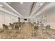 Spacious meeting room with chairs and a large screen TV at 8374 Quimby Cir # 8374, Davenport, FL 33896