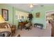 Inviting home office with a wood desk, comfortable chair, and lots of natural light at 8374 Quimby Cir # 8374, Davenport, FL 33896