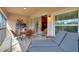 Spacious screened patio with modern furniture, perfect for relaxation and enjoying the outdoor ambiance at 8374 Quimby Cir # 8374, Davenport, FL 33896
