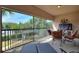 Large screened patio with comfortable lounge seating, offering scenic community views at 8374 Quimby Cir # 8374, Davenport, FL 33896