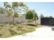 Backyard features a playset, shed, and mature trees, creating a fun and functional outdoor space at 9016 Pyrus St, Kissimmee, FL 34747