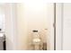 Compact half bathroom offering essential facilities and a minimalist design at 9016 Pyrus St, Kissimmee, FL 34747