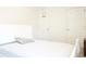 Bedroom features neutral carpet with doors leading to closet storage at 9016 Pyrus St, Kissimmee, FL 34747