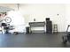 Spacious garage offers ample space for storage and hobbies, complete with equipment and vehicle at 9016 Pyrus St, Kissimmee, FL 34747